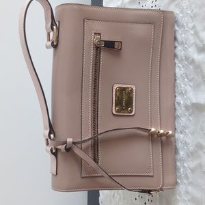 A Bellucci pocketbook has long strap as well with gold hardware.